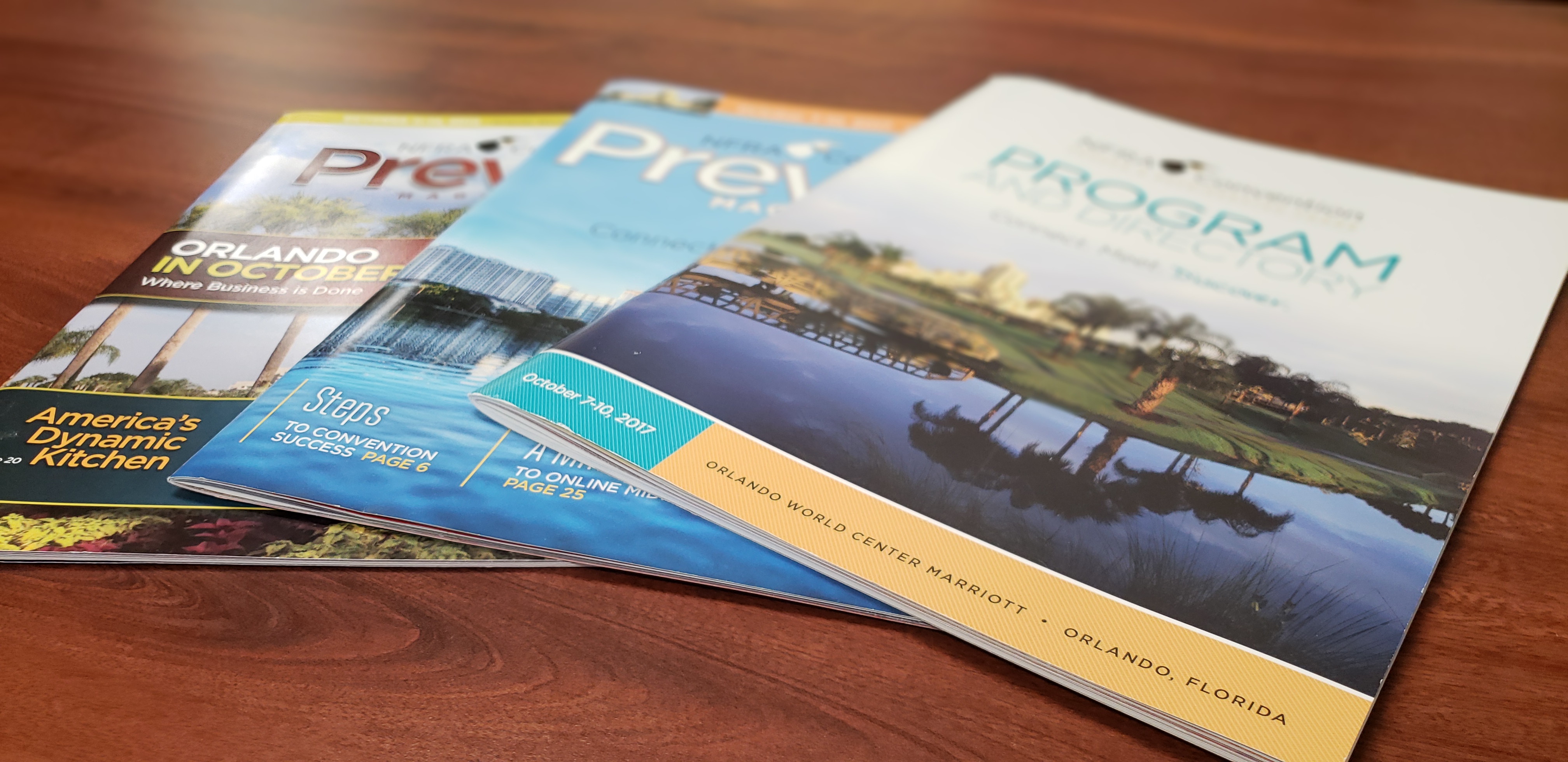 NFRA publications in pile on desk